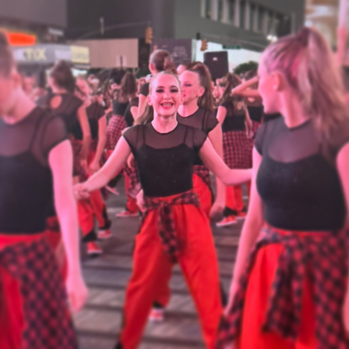 @skyelight_1313 living her dream in Times Square with @dancetheworldevents